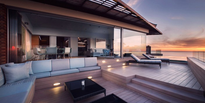 Deck-looks-over-the-ocean-and-sunset-at-Ellerman-Villa