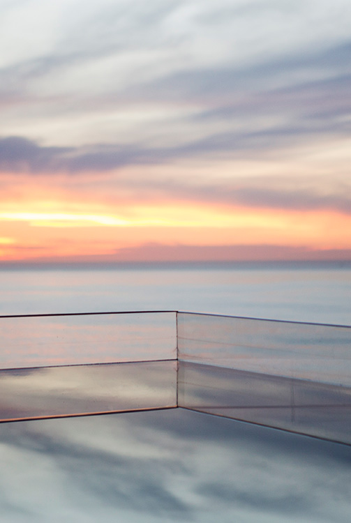 Infinity-Pool-looks-over-ocean-at-sunset-b